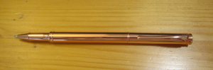 Staples Copper Stick Pen cap posted
