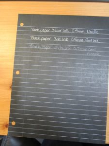 Black paper and writing sample