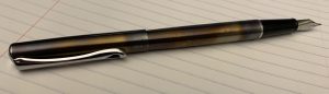 Image of the fountain pen with the cap posted.