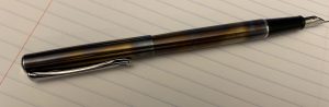 Image of the fountain pen with the cap posted.