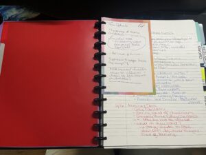 Open spread of notebook with multiple sizes of note pages. And yes, I pulled out the label maker for the tabs.