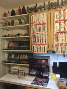 Shelves of Pentel Mechanical pencils, peg board with pencils, and legos.