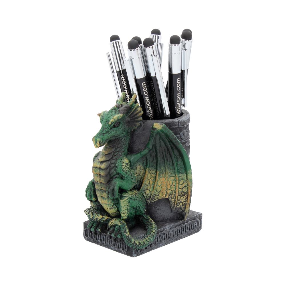 A green dragon pen holder with pens
